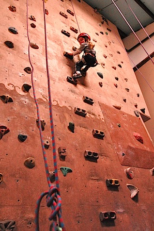 Meera up high on wall