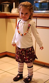 necklace and leg warmers